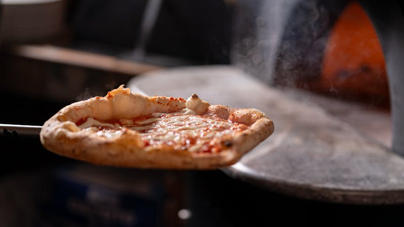 Four cheese pizza with golden crust